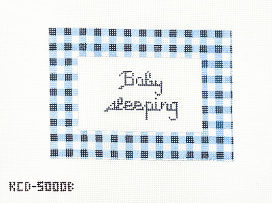 Baby Sleeping in Blue Gingham